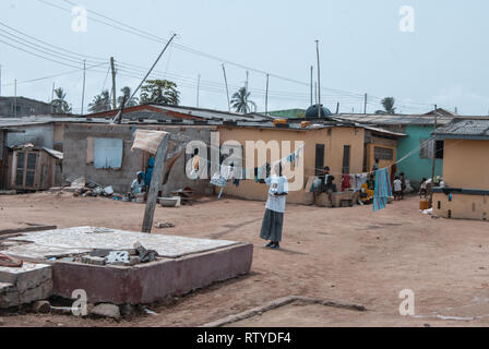 A photo of some houses habitat quarters in the coastal town of Elmina, Ghana, West Africa Stock Photo