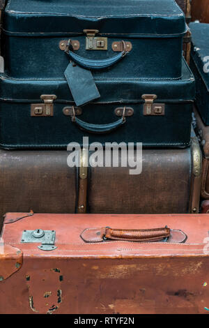 Decorative vintage ancient suitcases Background Stock Photo