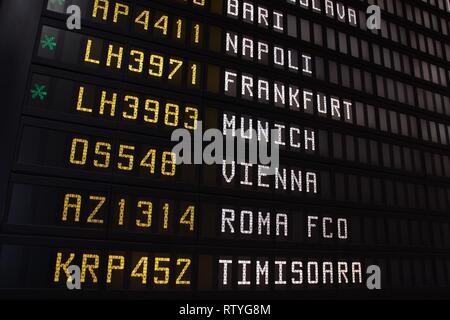 BOLOGNA, ITALY - OCTOBER 29: Departures board on October 29, 2009 in Bologna Airport, Italy. With almost 6 million passengers handled in 2012 it is th Stock Photo