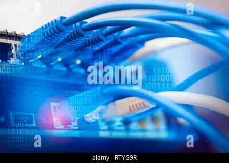 Network infrastructure, switch or router socket, cable connections. Ethernet, wired transmission, data center concept Stock Photo