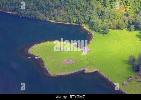 Naeroyfjord - famous UNESCO World Heritage Site in Norway. Beautiful fiord landscape in Sogn og Fjordane region. Aerial view of a farm. Stock Photo