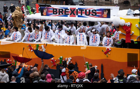 Braunschweig, Germany. 03rd Mar, 2019. Different motive cars, here one to the Brexit, drive with the so-called 'Schoduvel' by the city center in Braunschweig. The 'Schoduvel' carnival parade, which is more than six kilometres long, is considered one of the largest parades in northern Germany. Credit: Peter Steffen/dpa/Alamy Live News Stock Photo