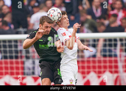 Stuttgart, Germany . 03rd Mar, 2019. Benjamin PAVARD, VFB 21  compete for the ball, tackling, duel, header, action, fight against Hendrik WEYDANDT, H96 26  VFB STUTTGART - HANNOVER 96  - DFL REGULATIONS PROHIBIT ANY USE OF PHOTOGRAPHS as IMAGE SEQUENCES and/or QUASI-VIDEO -  DFL 1.German Soccer League , Stuttgart, March 3, 2019,  Season 2018/2019, matchday 24, H96 Credit: Peter Schatz/Alamy Live News
