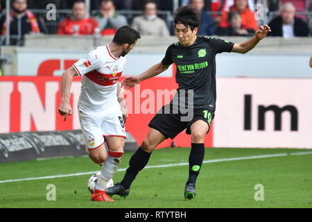 Stuttgart, Germany. 03rd Mar, 2019. Genki HARAGUCHI (Hannover96), Action, duels versus Gonzalo CASTRO (VFB Stuttgart) - Soccer 1. Bundesliga, 24.matchday, matchday24, VFB Stuttgart-Hanover 96 (H) 5-1, 03/03/2019 in Stuttgart/Germany. MERCEDES BENZ ARENA. DFL REGULATIONS PROHIBIT ANY USE OF PHOTOGRAPH AS IMAGE SEQUENCES AND/OR QUASI VIDEO. | usage worldwide Credit: dpa/Alamy Live News