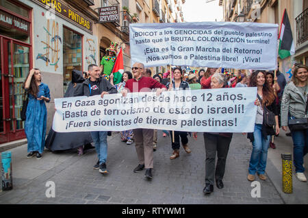 Madrid, Spain. 03rd Mar, 2019. A Carnival parade celebrating diversity took place at the neighbourhood of Lavapiés in Madrid, which is one of the most multicultural areas of the city. The parade ran trought the main streets of Lavapiés gathering hundreds of people of different cultures and social backgrounds.  In the picture, part of the parade was to protest for the freedom of people in Palestina. Credit: Lora Grigorova/Alamy Live News Stock Photo