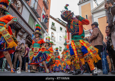 Madrid, Spain. 03rd Mar, 2019. A Carnival parade celebrating diversity took place at the neighbourhood of Lavapiés in Madrid, which is one of the most multicultural areas of the city. The parade ran trought the main streets of Lavapiés gathering hundreds of people of different cultures and social backgrounds.  In the picture, bolivian citizens showing some of the traditional dances of their country wearing folkloric clothes. Credit: Lora Grigorova/Alamy Live News Stock Photo