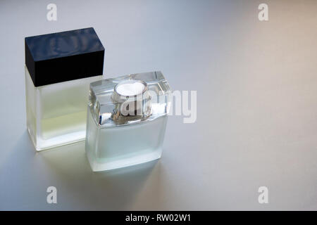 Two rectangular glass perfume bottles isolated on white background with a copy space Stock Photo