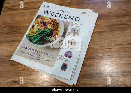 newspaper masthead on the Waitrose and Partners Weekend House Magazine in house newspaper on a table Stock Photo