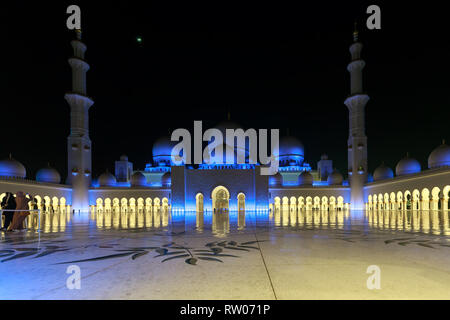 ABU DHABI, UAE, JANUARY 10, 2019: Magnificent view of the inner area of The Sheikh Zayed Grand Mosque, beautifully illuminated with blue light Stock Photo