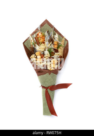 Original bouquet consisting of dried salted fish, salted peanuts, crackers, dried bread and other beer snacks isolated on white background. Top view Stock Photo