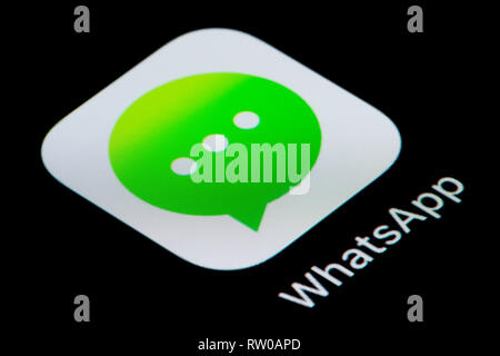 A close-up shot of the WhatsApp app icon, as seen on the screen of a smart phone (Editorial use only) Stock Photo