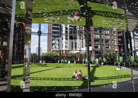 Victorian gas holder encloses new park in King's Cross, London Stock Photo