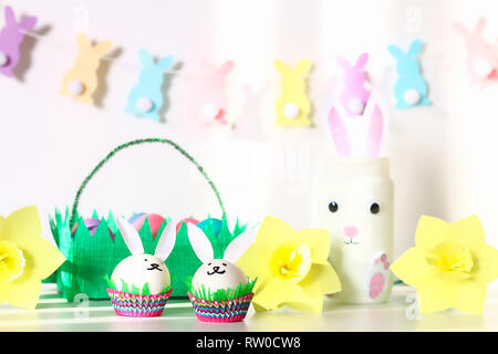 Diy decor for Easter. Paper garlands, vase bunny, daffodils, eggs