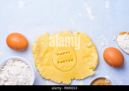 Easter Baking Background, Dough with Happy Easter Lettering, Festive Concept Stock Photo