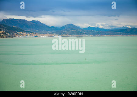 Salerno city and Tyrrhenian sea view from road to Amalfi in cloudy day in winter, Italy Stock Photo