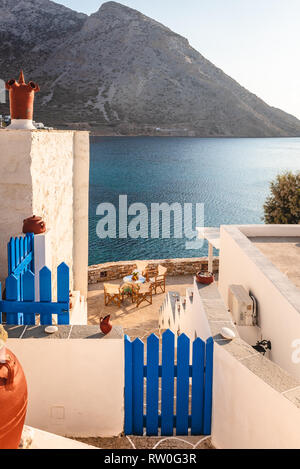 SIFNOS, GREECE - September 10, 2018: Traditional Greek house overlooking the bay of the island of Sifnos. Greece Stock Photo