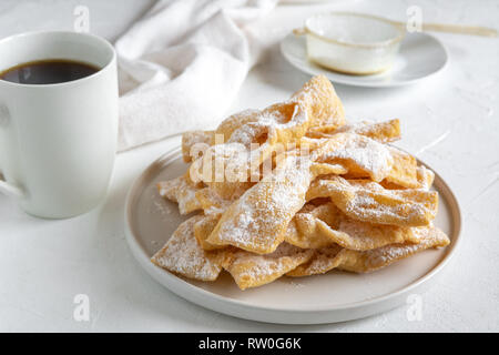Faworki, Chrusty, Angel Wings - traditional Polish pastries served during Carnival Fat Thursday, just befor Lent. Stock Photo