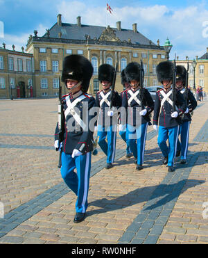 COPENHAGEN, DENMARK - JUNE 14, 2018: Danish Royal Guard marching at square by Amalienborg Palace Stock Photo