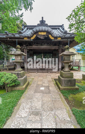 Setagaya, Tokyo, Japan - August 19, 2017: Moriiwao Temple. Awashimado hall devoted to Awashima-sama shinto deity who protects women from illness Stock Photo