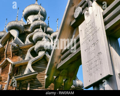 Plinths of windows of wooden houses. Ancient style of decoration of window frames. Stock Photo