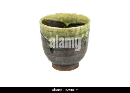 A handmade ceramic mug isolate on white background. With clipping path. Stock Photo