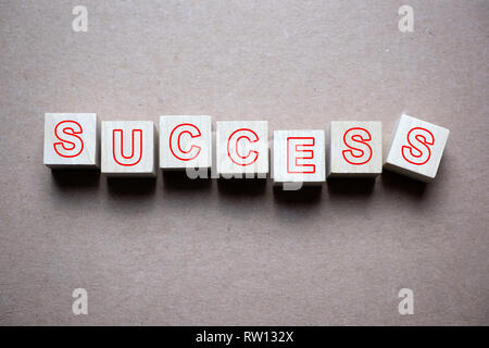 Success word written on wood cube Stock Photo