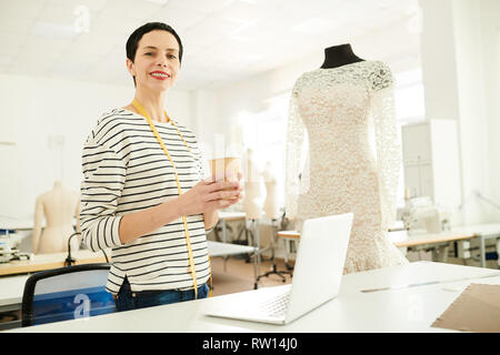 Working in fashion studio Stock Photo