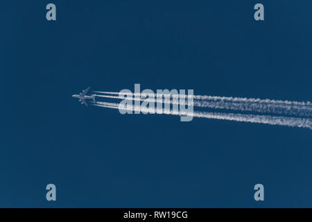 Airbus A380, double-deck, wide-body, four-engine jet airliner flying at altitude with contrail from the four engines, Air France aircraft Stock Photo