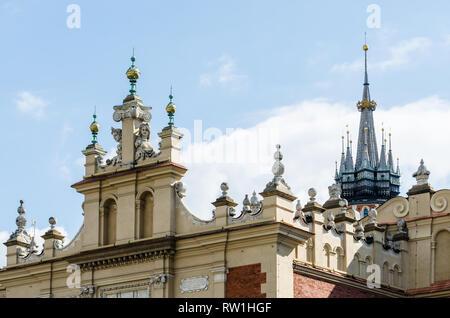 Architectural details of cloth hall and St. Mary's Basilica tower, Main Square, Old Town, Krakow, Poland Stock Photo