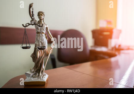 Law and Justice concept. Mallet of the judge, books, scales of justice.  Courtroom theme. Stock Photo