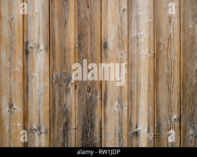Wood slats background,old exterior cladding with vertical planks. Stock Photo