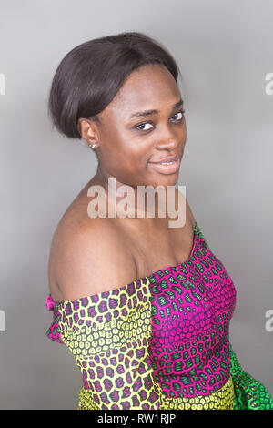 Happy Black Nigerian woman in colourful Ankara attire Stock Photo - Alamy