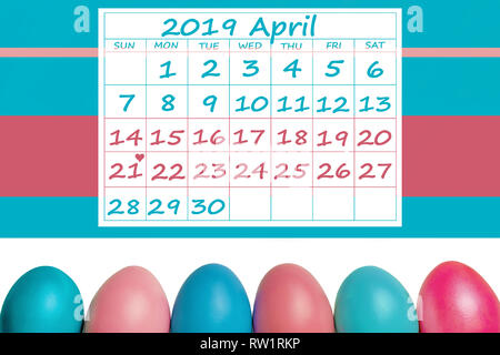 Happy Easter April 2019 Calendar colorful with easter eggs in a row and colorful stripes Stock Photo