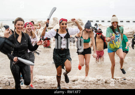 Beijing, USA. 3rd Mar, 2019. Participants take part in the 19th annual Chicago Polar Plunge at North Avenue Beach in Chicago, the United States, on March 3, 2019. Chicago hosted the 19th annual Chicago Polar Plunge on Sunday to raise funds for the Special Olympics Chicago athletes. Credit: Joel Lerner/Xinhua/Alamy Live News Stock Photo