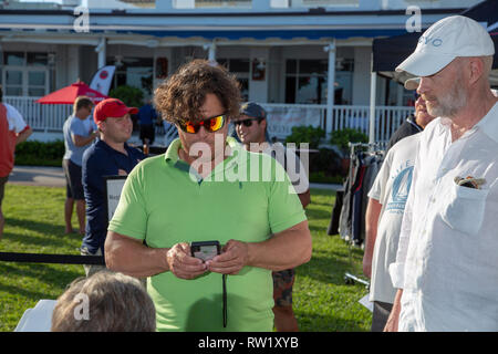 International Star Class Yacht Racing Association sailors participating in the 2019 Bacardi Cup Regatta signing up to register for the event Stock Photo