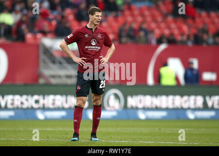 02 March 2019, Bavaria, Nürnberg: Soccer: Bundesliga, 1st FC Nuremberg - RB Leipzig, 24th matchday in Max Morlock Stadium. The Nuremberg Patrick Erras. Photo: Daniel Karmann/dpa - IMPORTANT NOTE: In accordance with the requirements of the DFL Deutsche Fußball Liga or the DFB Deutscher Fußball-Bund, it is prohibited to use or have used photographs taken in the stadium and/or the match in the form of sequence images and/or video-like photo sequences. Stock Photo