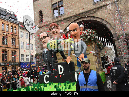 Cologne, Germany. 04th Mar, 2019. Cologne, Germany. 04th Mar, 2019.  A theme car with the figure of CDU chairman Annegret Kramp-Karrenbauer (M) drives in the Shrove Monday procession. With the Rose Monday processions, the Rhineland street carnival reaches its climax. Photo: Federico Gambarini/dpa Credit: dpa picture alliance/Alamy Live News Stock Photo