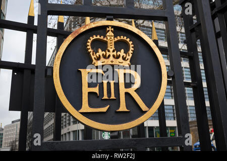 London, England - February 28, 2019:  Elizabeth II Regina ER royal insignia on the gate of the Tower of London, England. Stock Photo