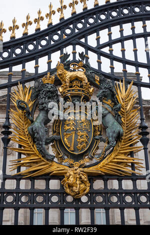 London, England - February 28, 2019, Royal arms on the gate of Buckingham Palace, the London residence of Her Majesty Queen Elizabeth 2nd Stock Photo