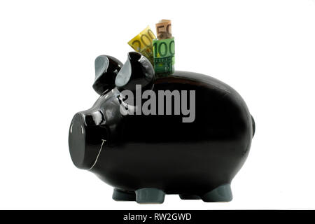 black piggy bank with euro banknotes isolated on white background Stock Photo