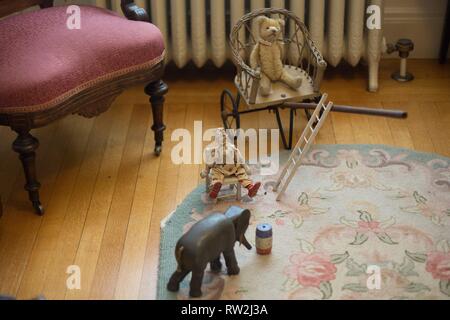 Children's toys on a bedroom floor on display at Pittock Mansion in Portland, Oregon, USA. Stock Photo