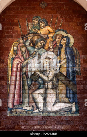 Stations of the Cross:Veronica wipes the face of Jesus; A panel of Portuguese tiles outside the shrine of Fatima Stock Photo