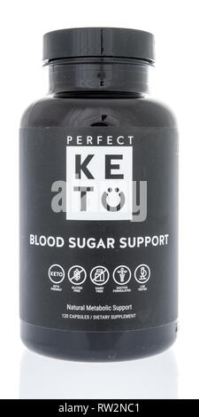 Winneconne, WI - 21 February 2019: A bottle of  Perfect Keto blood sugar support supplement on an isolated background Stock Photo