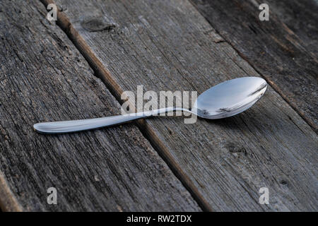 knife and fork on wooden background. Cutlery on wooden. Stock Photo
