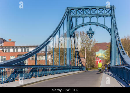 People on the Kaiser Wilhelm bridge in Wilhelmshaven, Germany Stock Photo