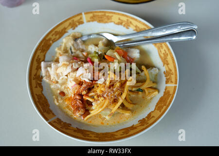 Mie Caluk Lontong Aceh, Rice Cake Soup and Spageti from Aceh, Indonesia Stock Photo