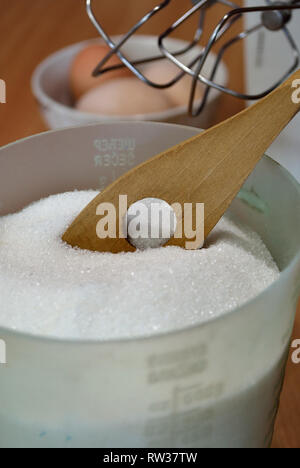 Sugar  in a measuring cup Stock Photo