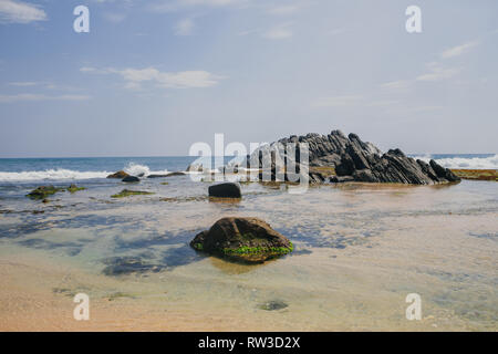 Exotic landscape with stones in ocean, sea Stock Photo