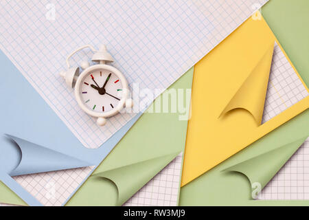 Back to school background with books and alarm clock Stock Photo - Alamy