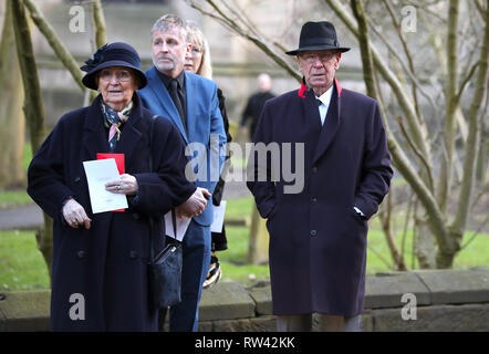 Sir Bobby Charlton (right) and wife Norma Ball during the funeral service for Gordon Banks at Stoke Minster. Stock Photo
